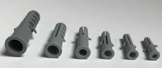 grey plastic wall plug